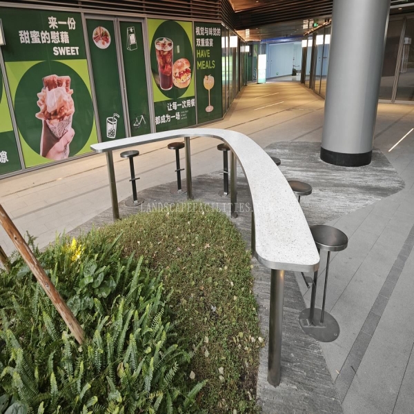 A small stainless steel and terrazzo material customized outdoor bar counter