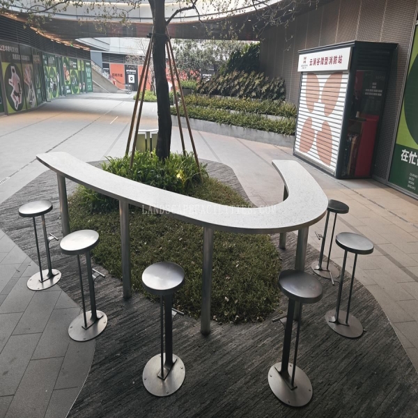 A small stainless steel and terrazzo material customized outdoor bar counter